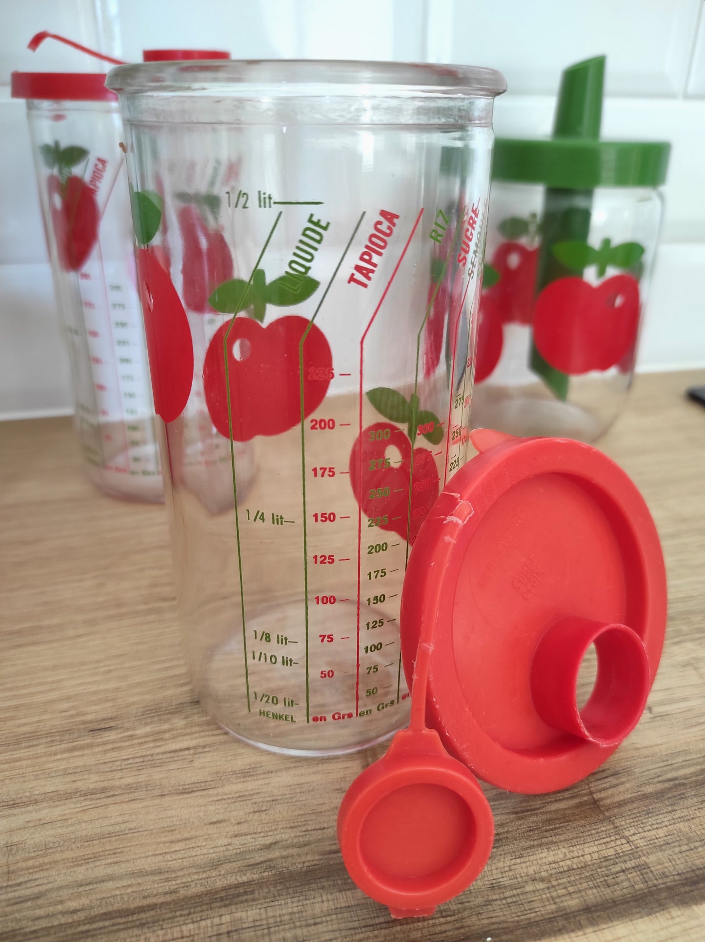 Pot/bocal de conservation Henkel Vintage verre mesureur motif pomme
