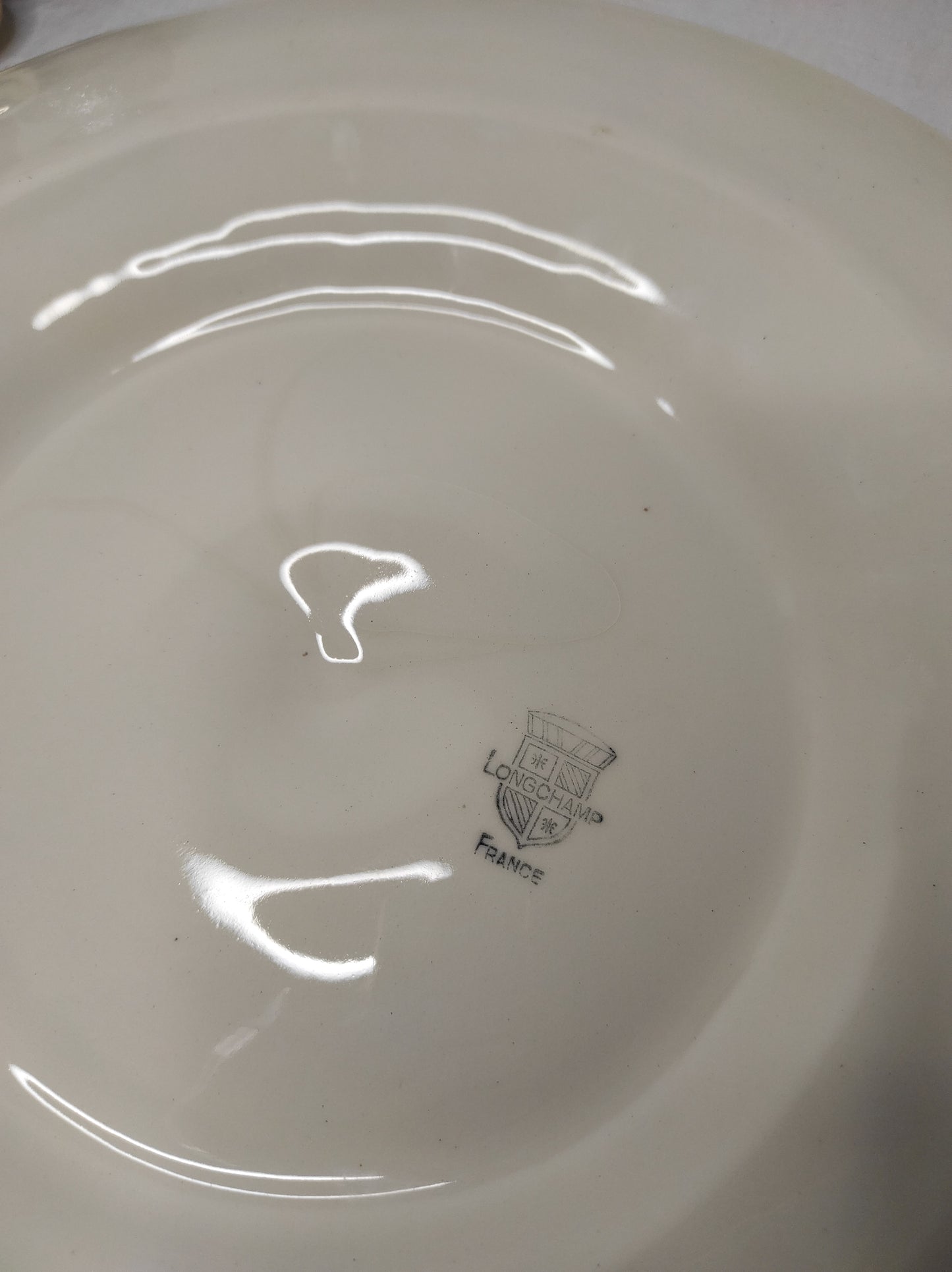 Ancien plat de service à huîtres/coquillages en barbotine LONGCHAMP